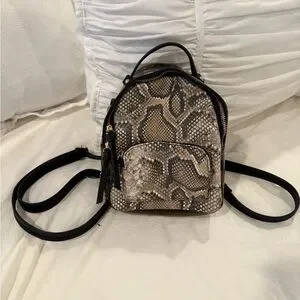 free people mini backpack snake print Cute Animal School for Teen Girls Boys Lightweight Student Backpack Travel Bookbag Laptop Casual Daypack 16x11.4x6.9 inch A backpack just big enough for keeping it light Free People Stylish Black and